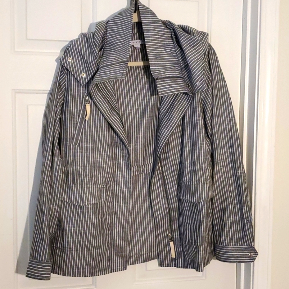 28"long. Unique piece, 3 Pockets.